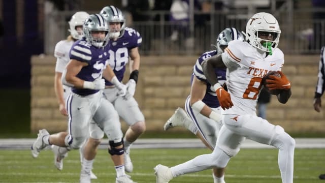 Texas Longhorns wide receiver Xavier Worthy (8) carries the ball during the Texas Longhorns football game against Kansas State at Bill Snyder Family Stadium in Manhattan, Kansas on Saturday, Nov. 5, 2022. 